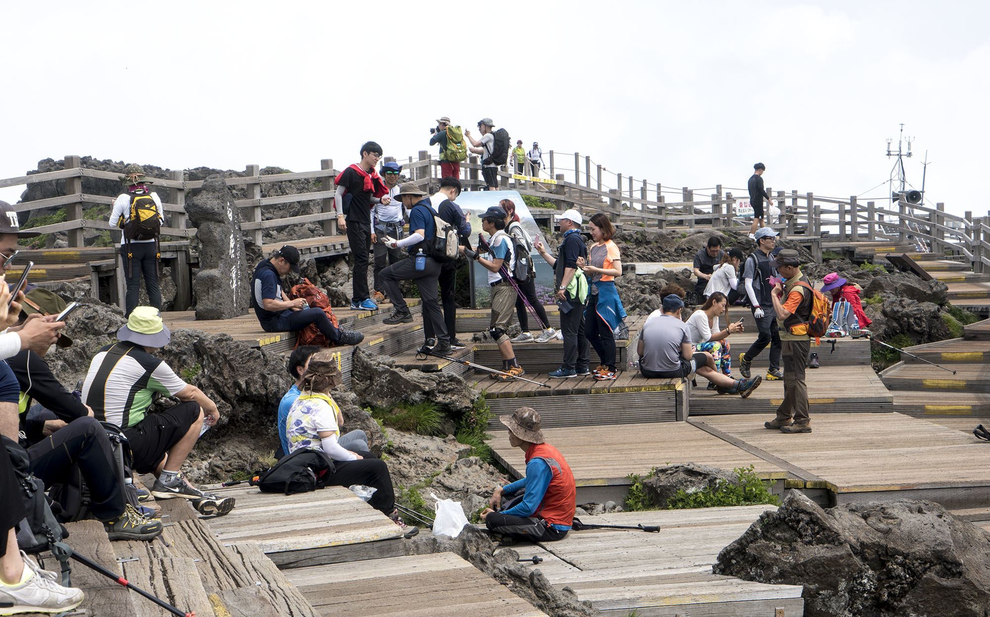 Hikers at the peak of Hallasan Jeju Island Republic of Korea