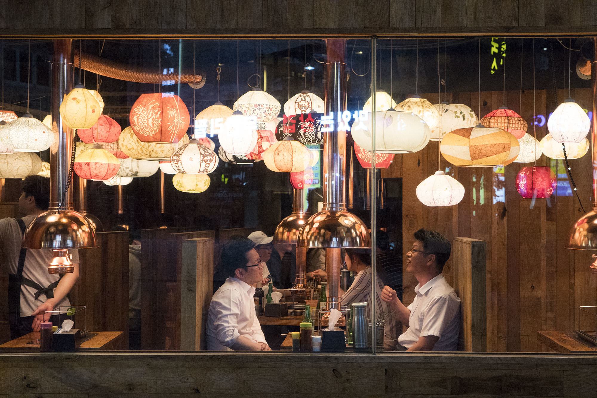 People dining at a restaurant in Hongdae Seoul Republic of Korea