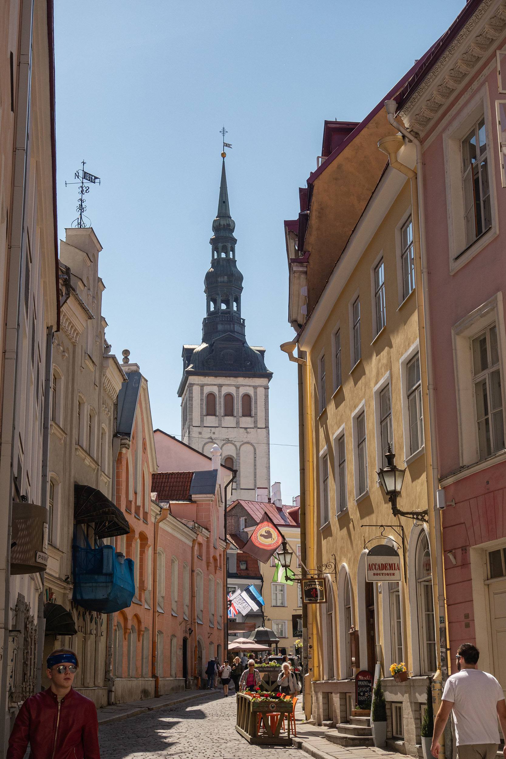 People walking through Tallinn Old Town Estonia