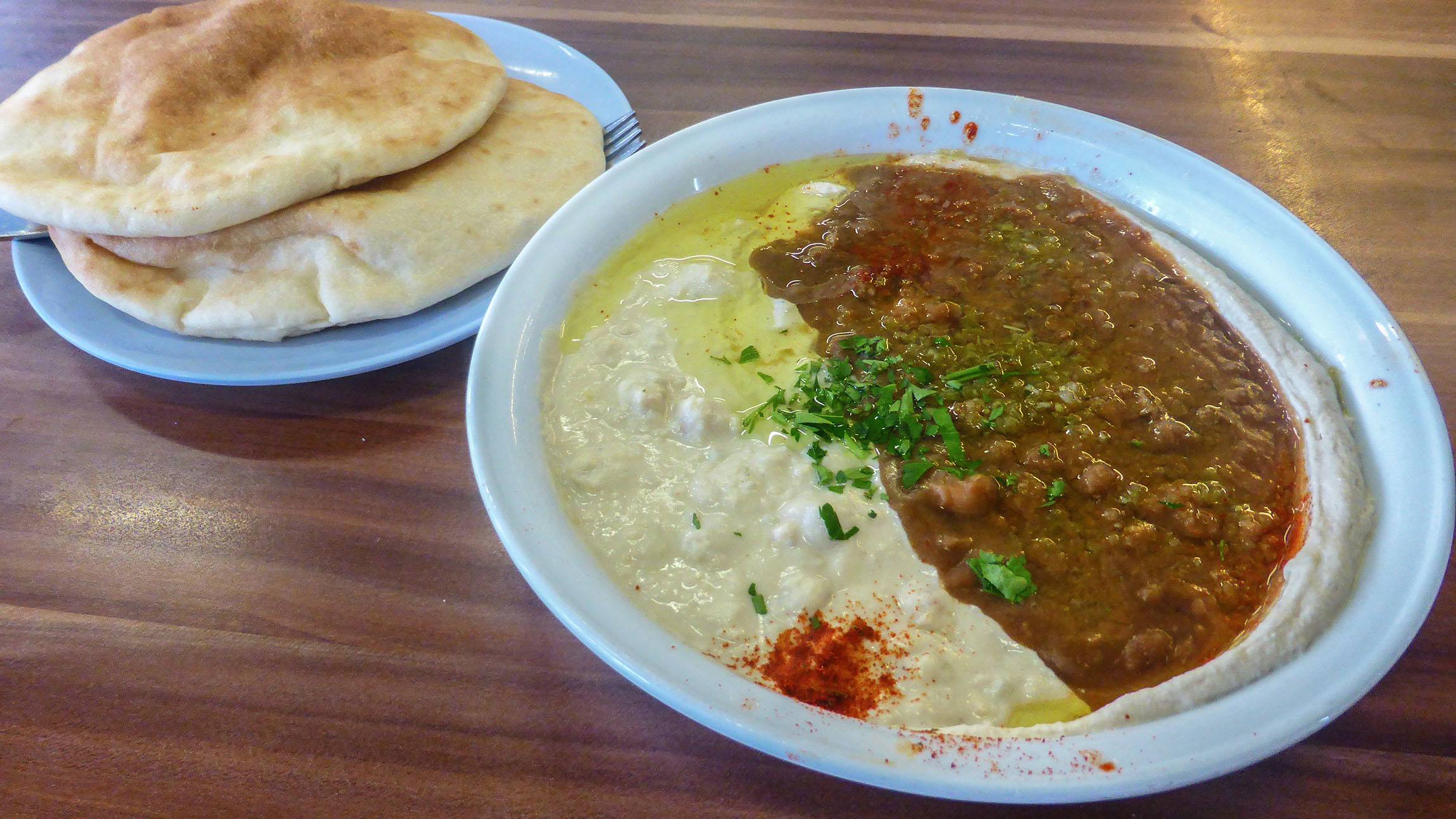 Pita hummus and beans purchased at a restaurant in Tel Aviv Israel