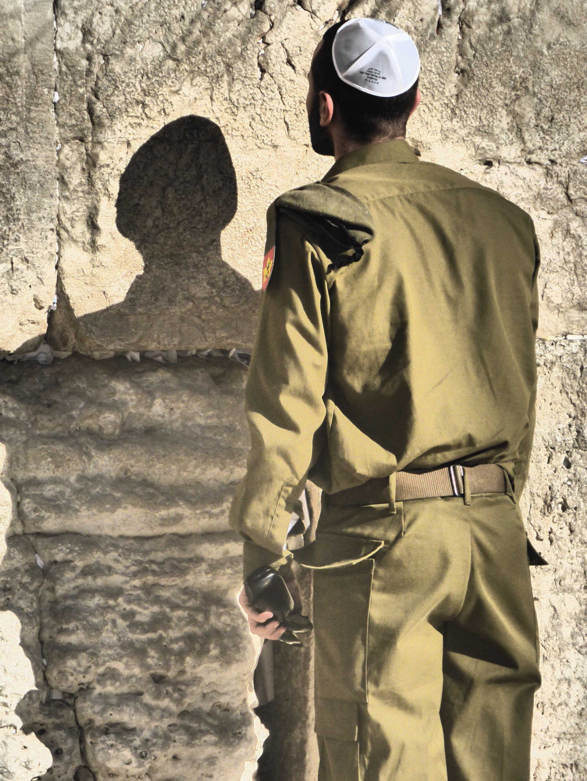 Soldier at Wailing Wall in Jerusalem Israel