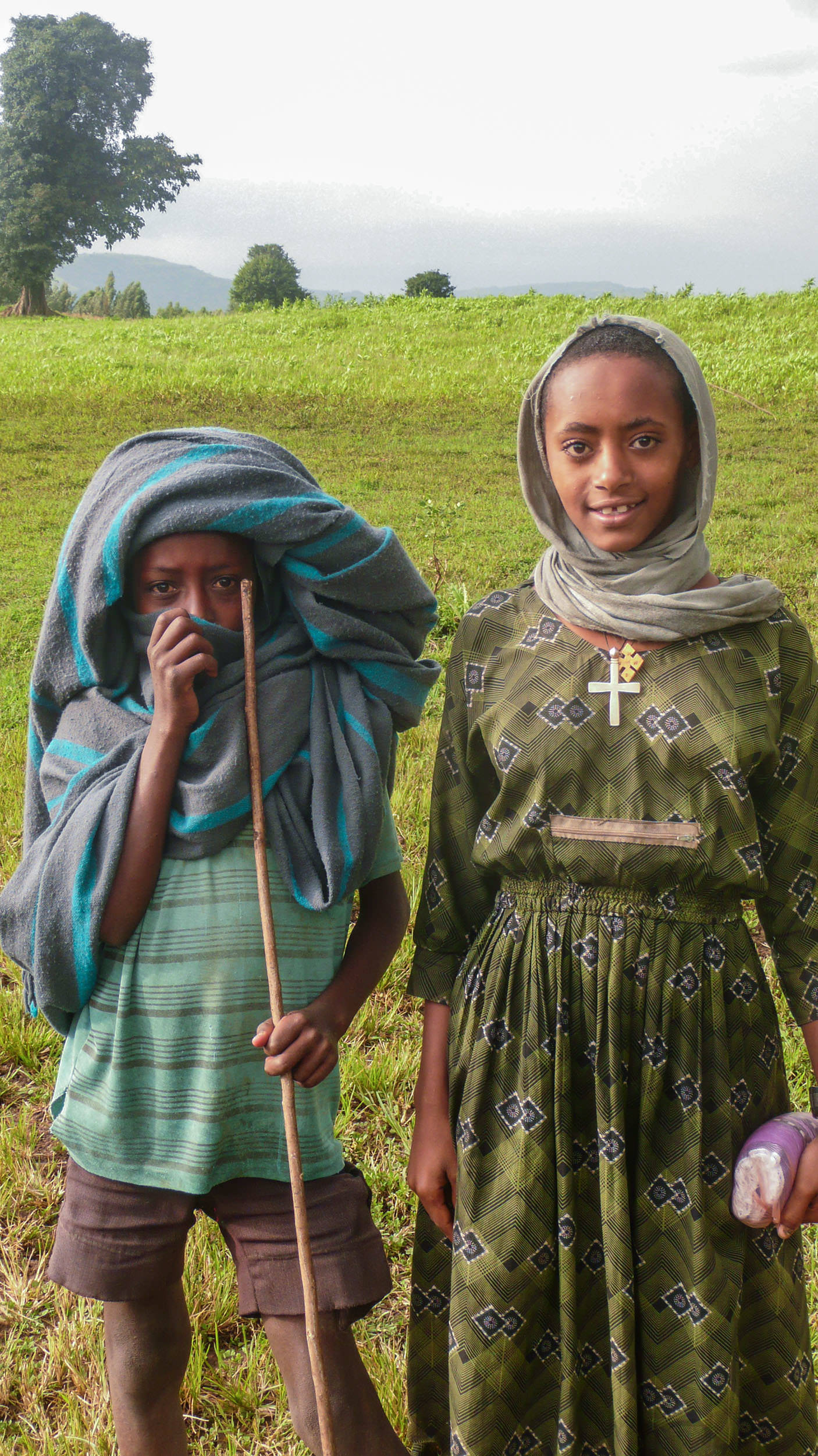 Two Ethiopian children providing assistance at Blue Nile Falls Ethiopia