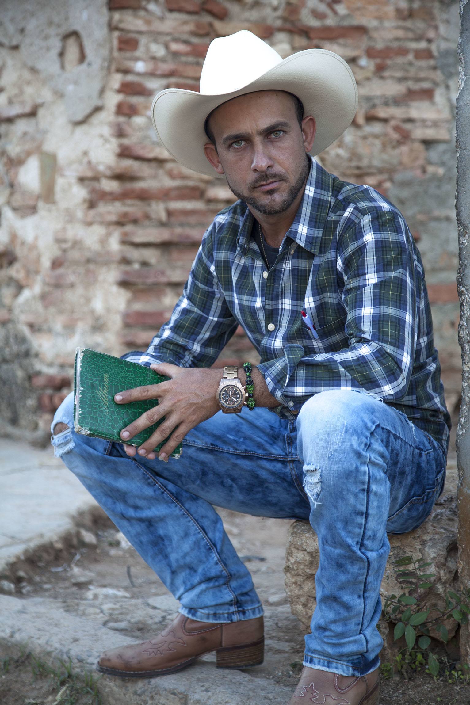 A Cuban cowboy in the streets of Trinidad Cuba