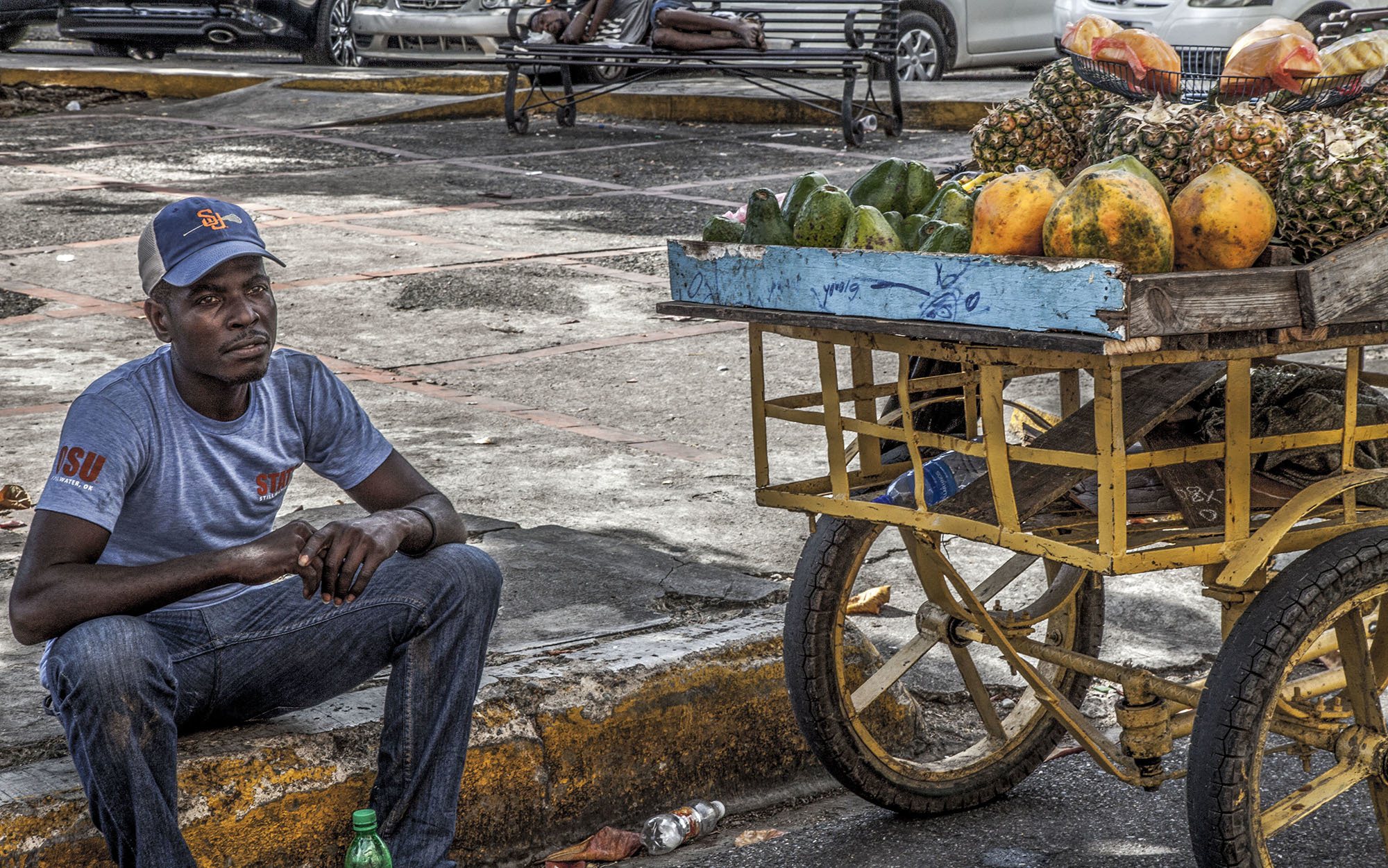 A Haitian immigrant selling fruit in Santo Domingo Dominican Republic