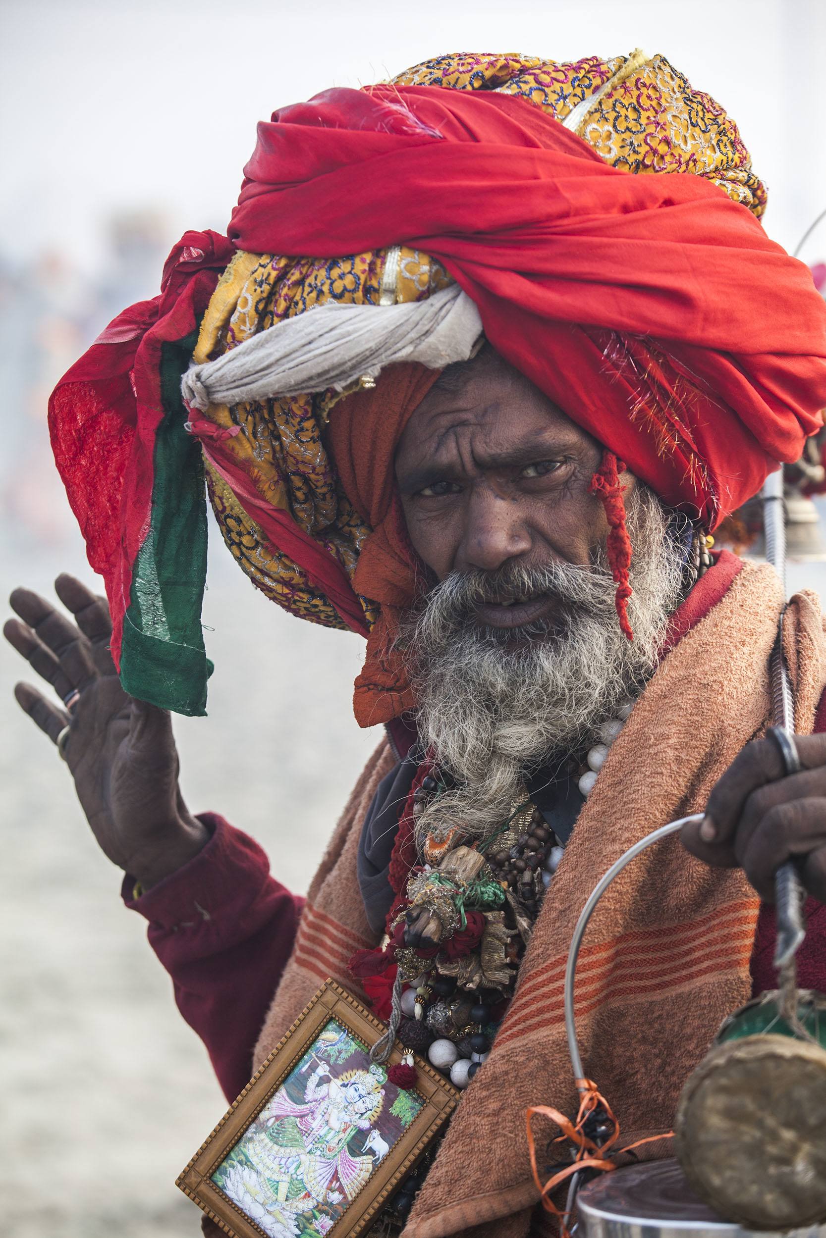 A brightly dressed holy man at Marg Melah Allhabad India