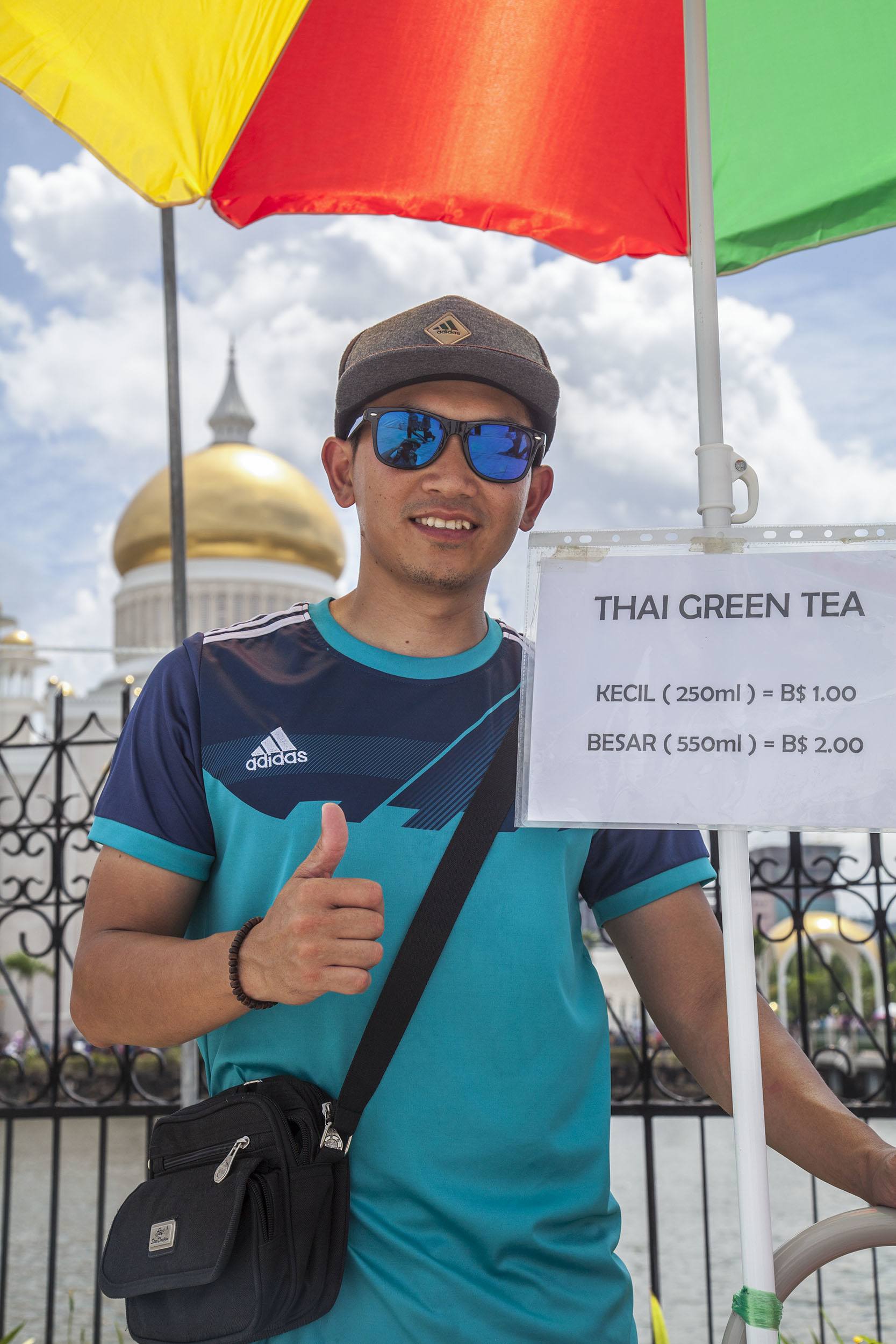 A man selling green tea outside Masjid Omar Ali Saifuddien in Bandar Seri Begawan Brunei Darussalam