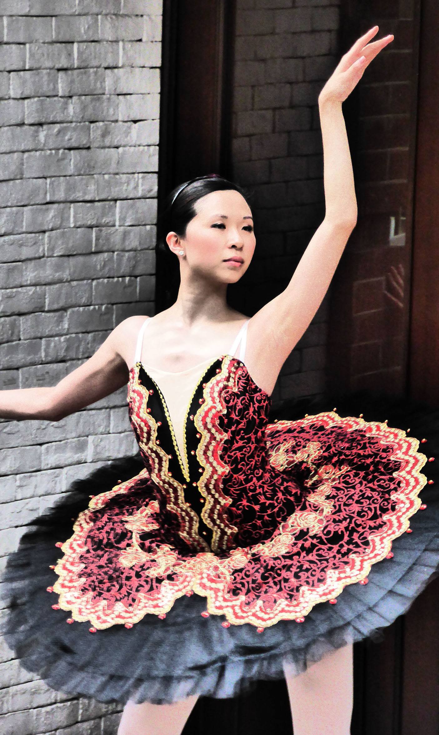 Ballerina posing outside a studio in Hong Kong