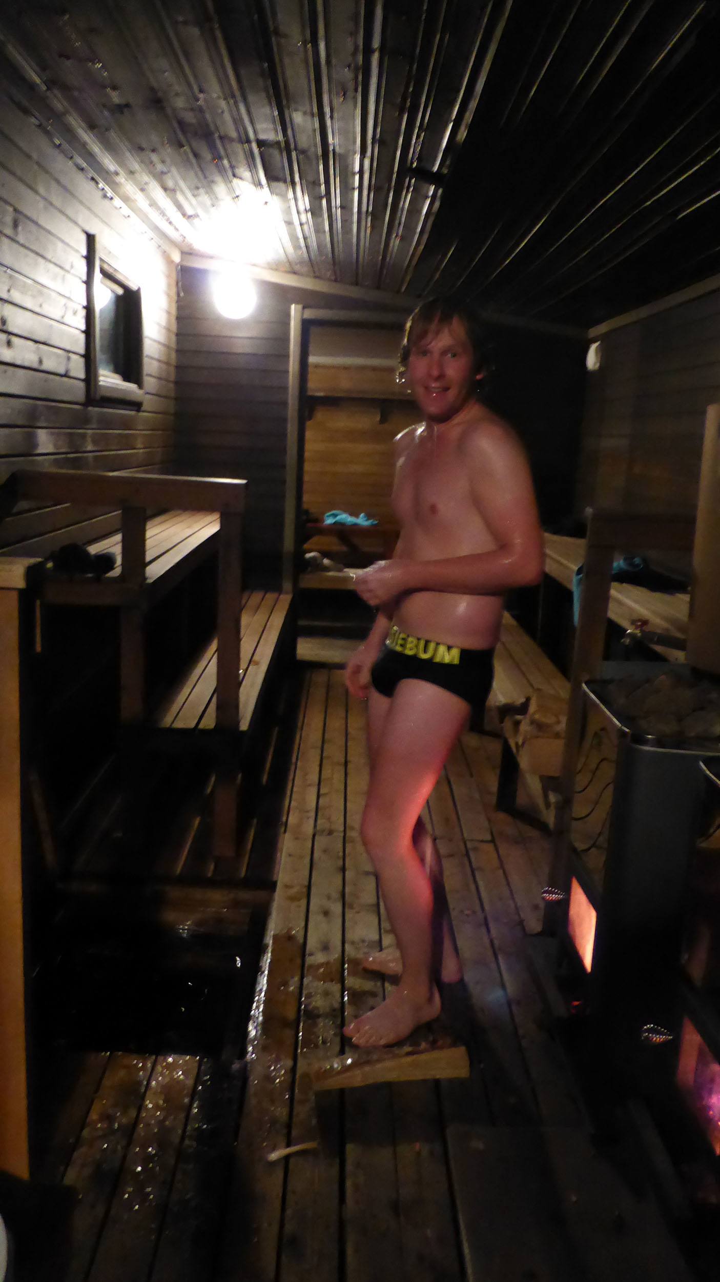 Ben in the sauna at Camp Alta Sweden after having plunged into the icy waters of the frozen lake