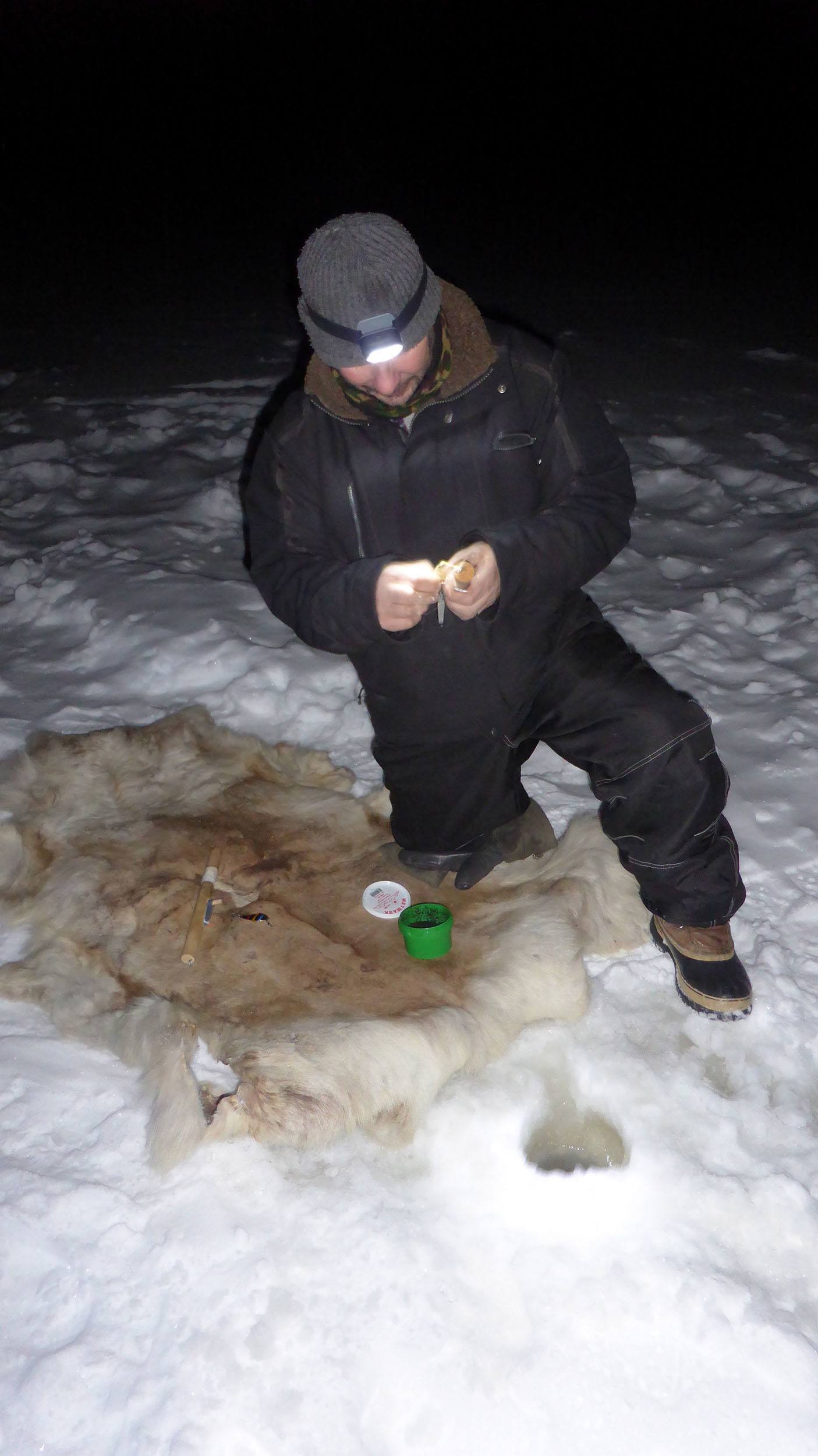 Camp Alta host ice fishing Sweden