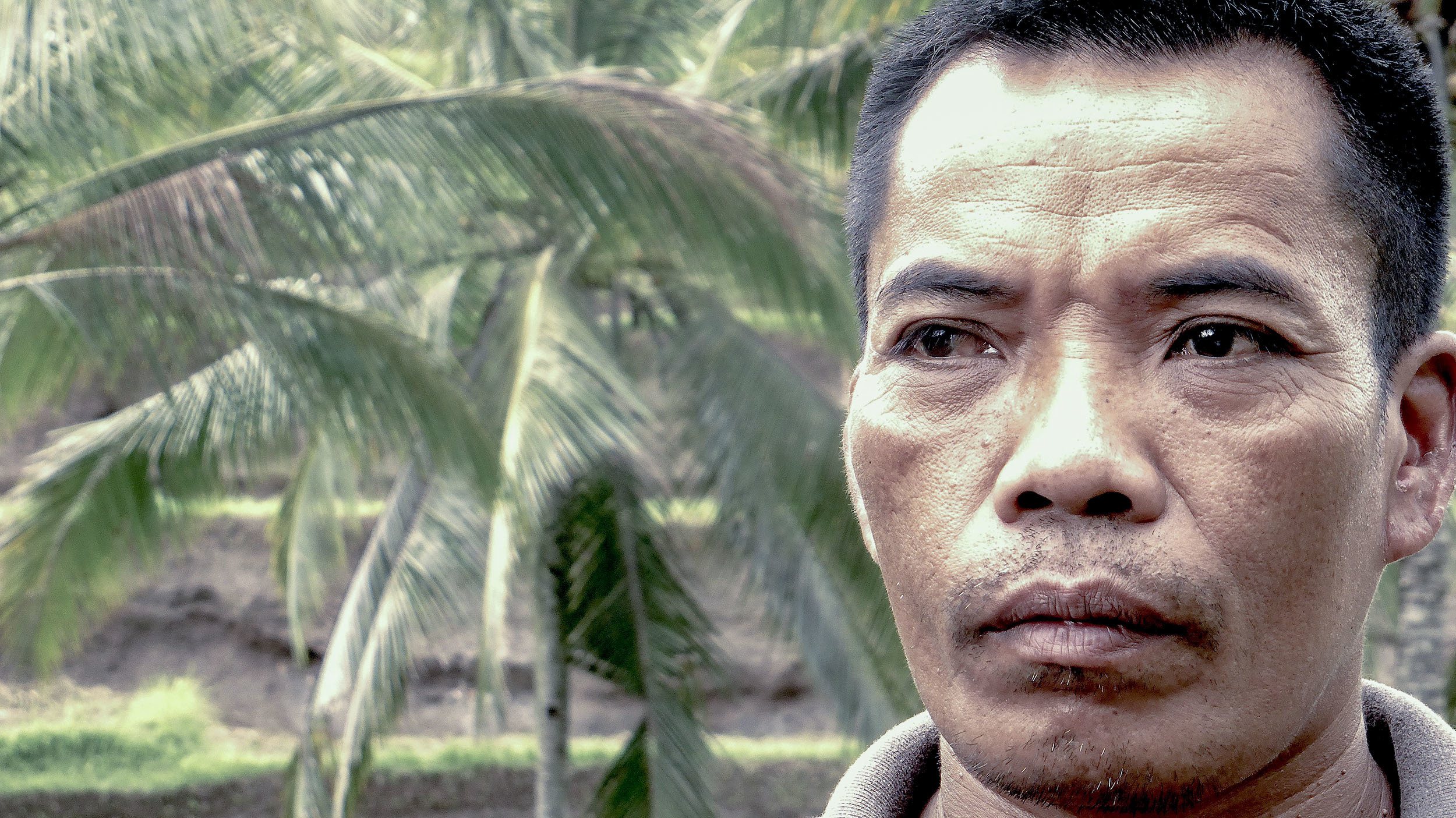 Indonesian man at Tegalalang Rice Terrace near Ubud Bali Indonesia