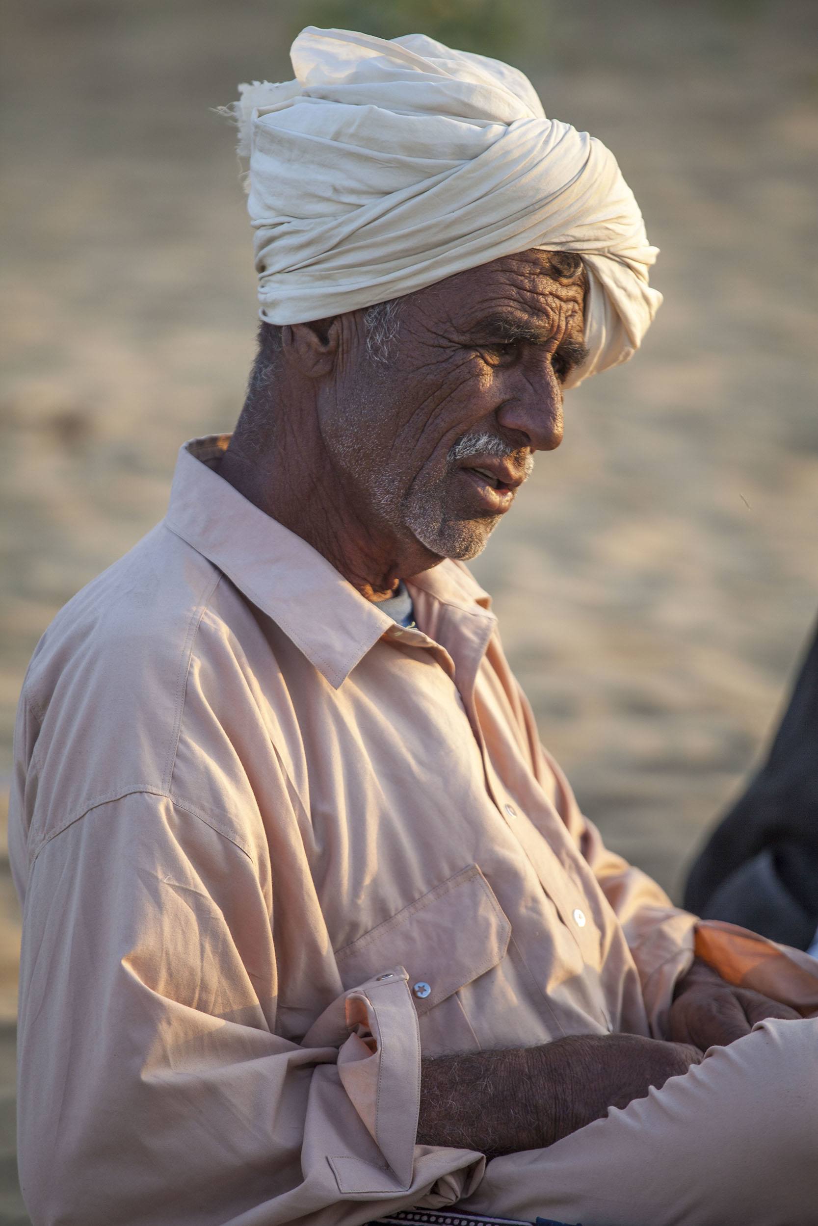 Men in turban in desert near Jaisalmer India