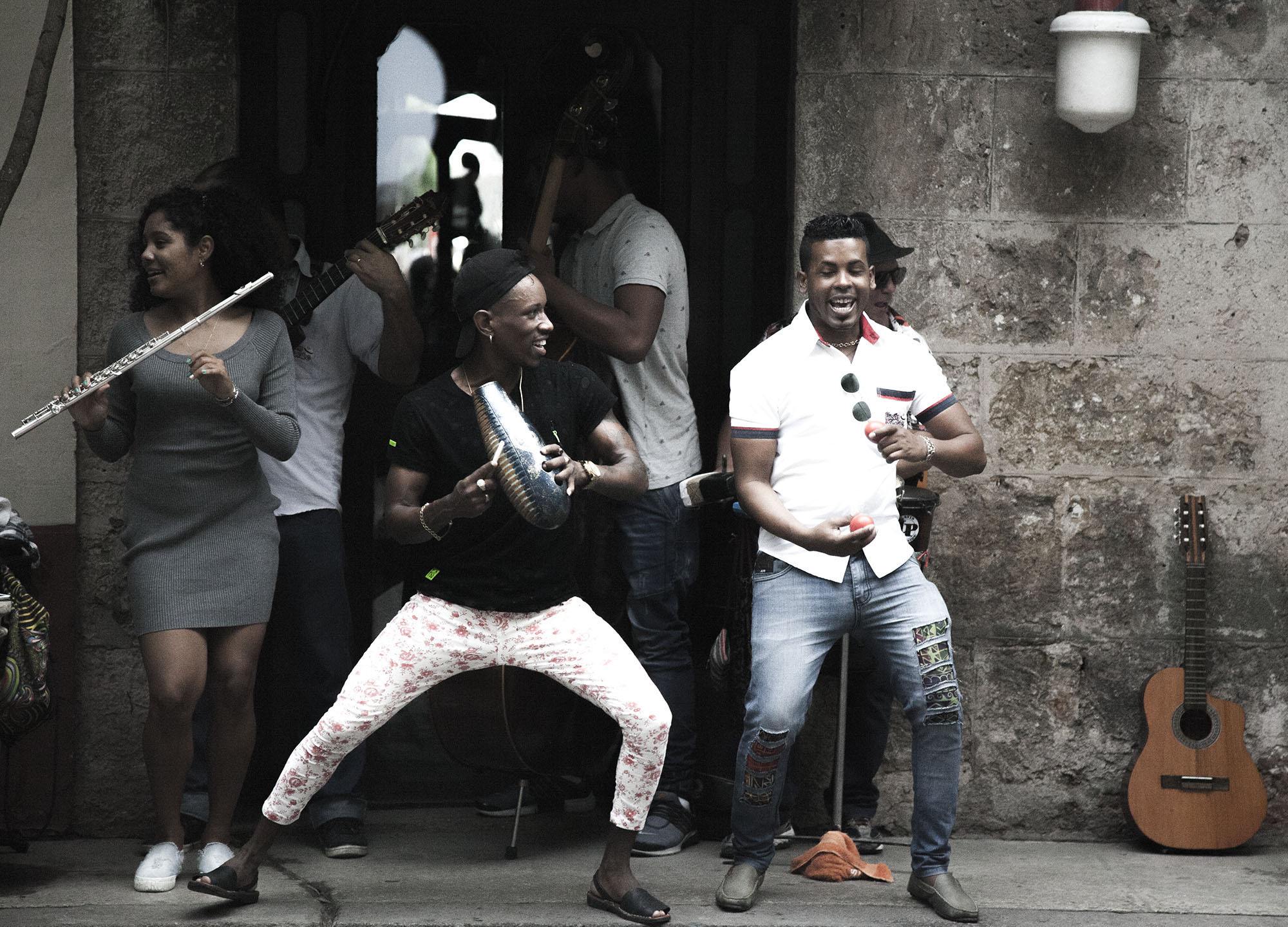 Musicians and dancers entertaining in the streets of Havana Cuba