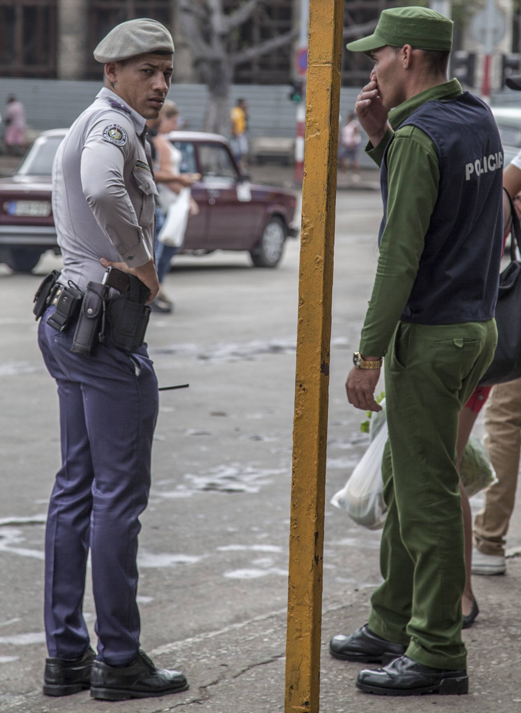 Police officers in the streets of Havana Cuba