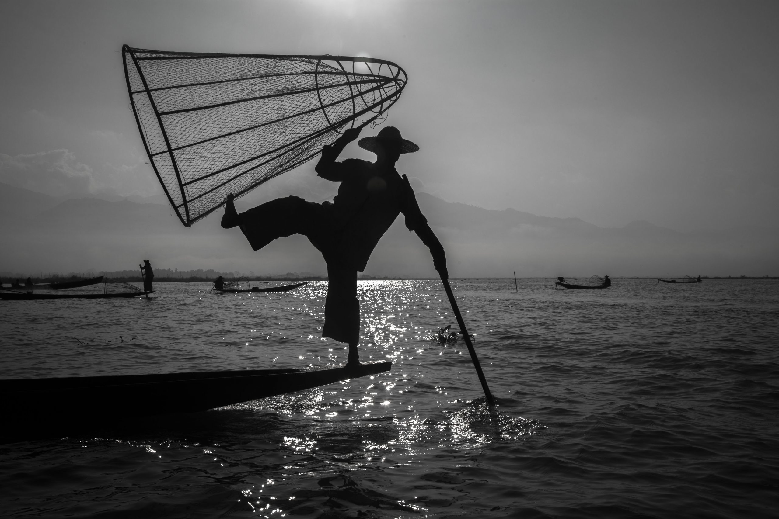 Silhoutette of fisherman on Inle Lake Myanmar