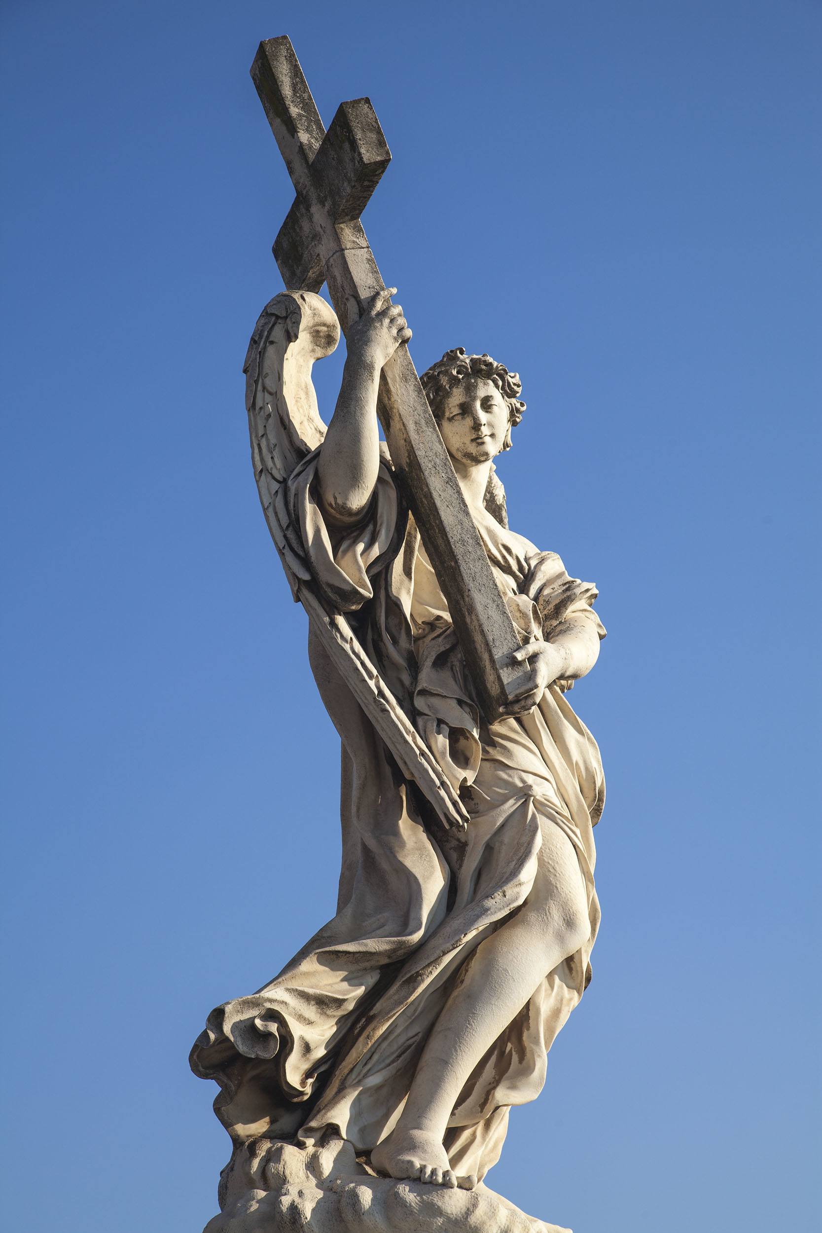 Statue of an angel on Ponte Sant'Angelo over the Tiber in Rome Italy