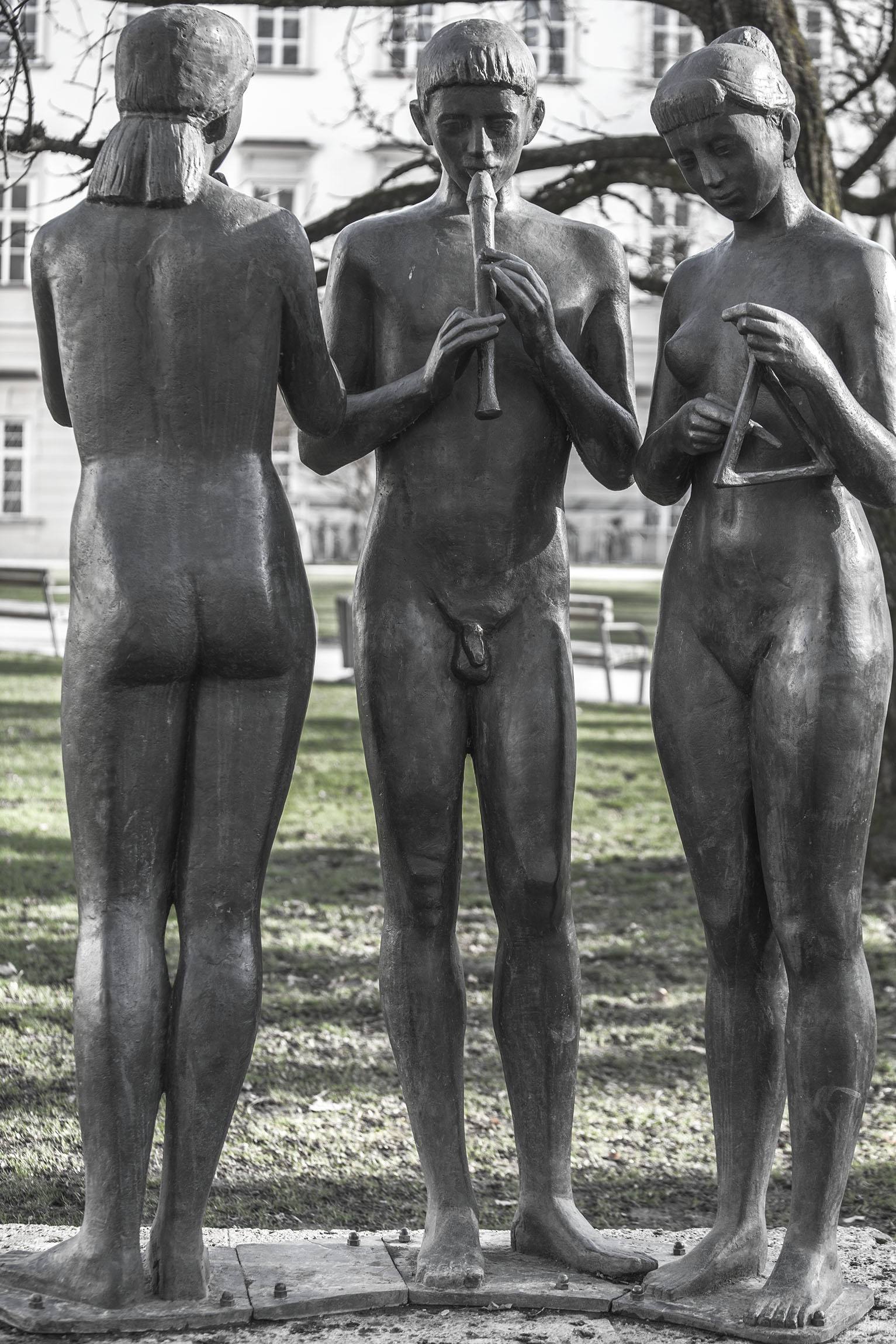 Trio Making Music sculpture by Max Rieder in Kurgarten in Mirabell Gardens Salzburg Austria