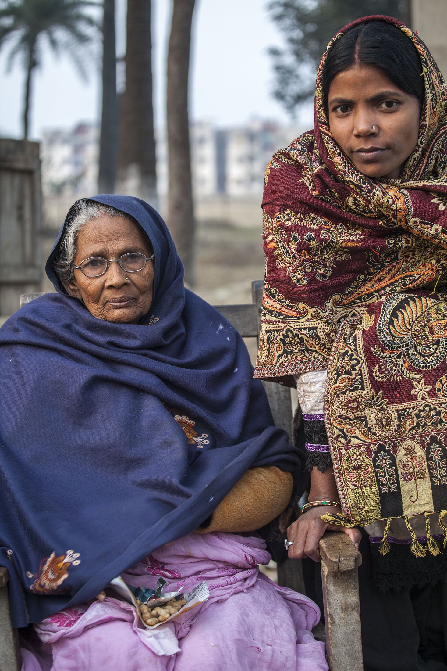 Two women by the road in Ghazipur India