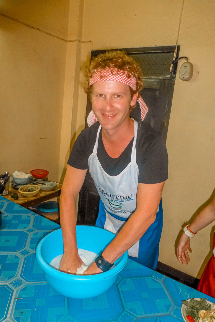 3 Ben preparing coconut milk at Baan Thai cooking school in Chiang Mai, Thailand