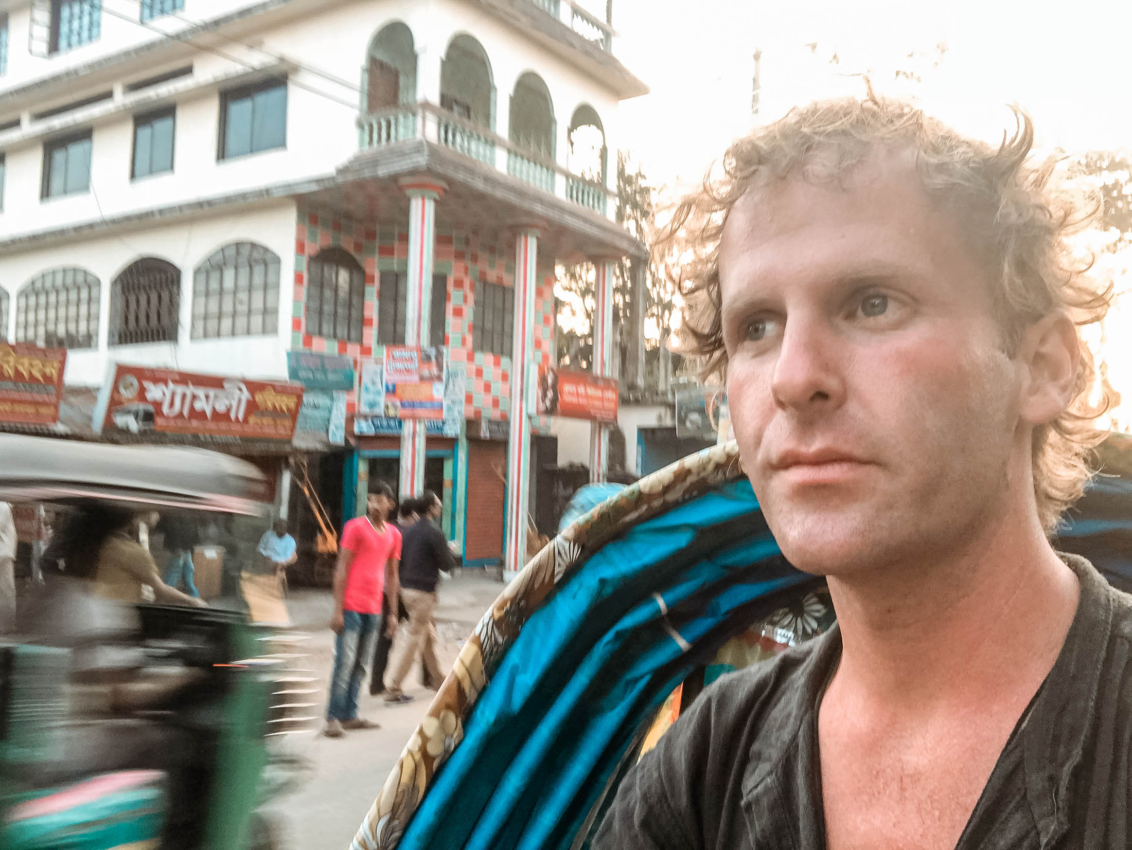 Ben on a rickshaw travelling through Sreemangal, Bangladesh