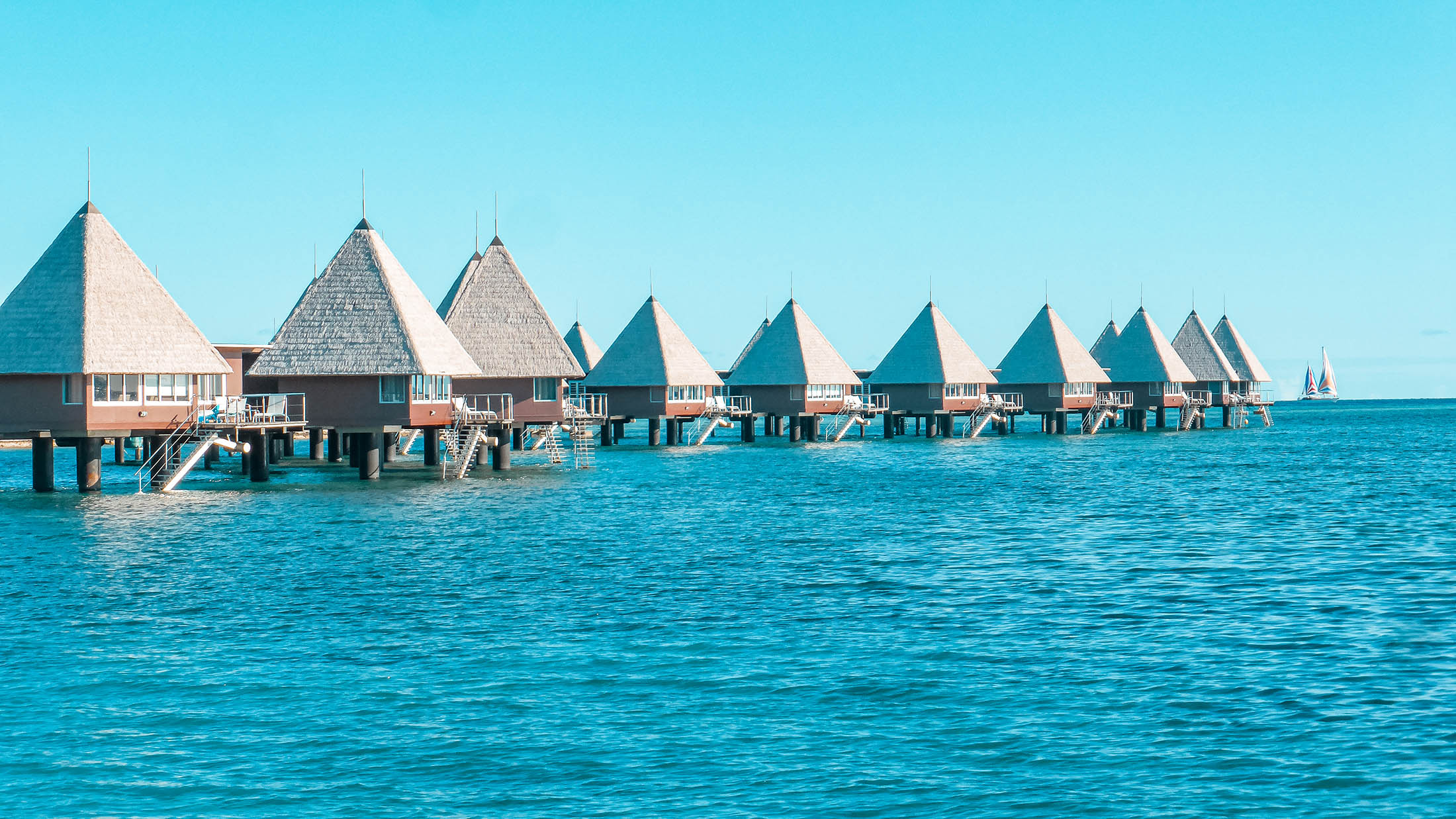 Overwater bungalows of resort on Master Islasnd (Îlot Maître), New Caledonia