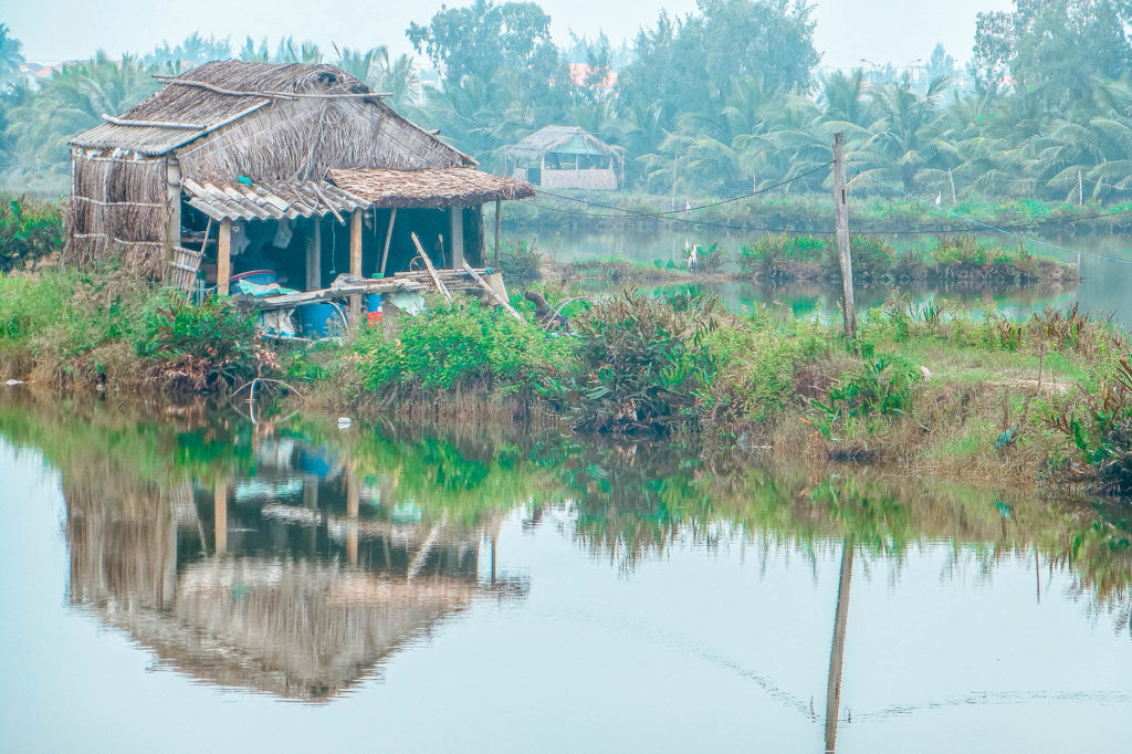 Simple homes near water outside of Hoi An, Vietnam