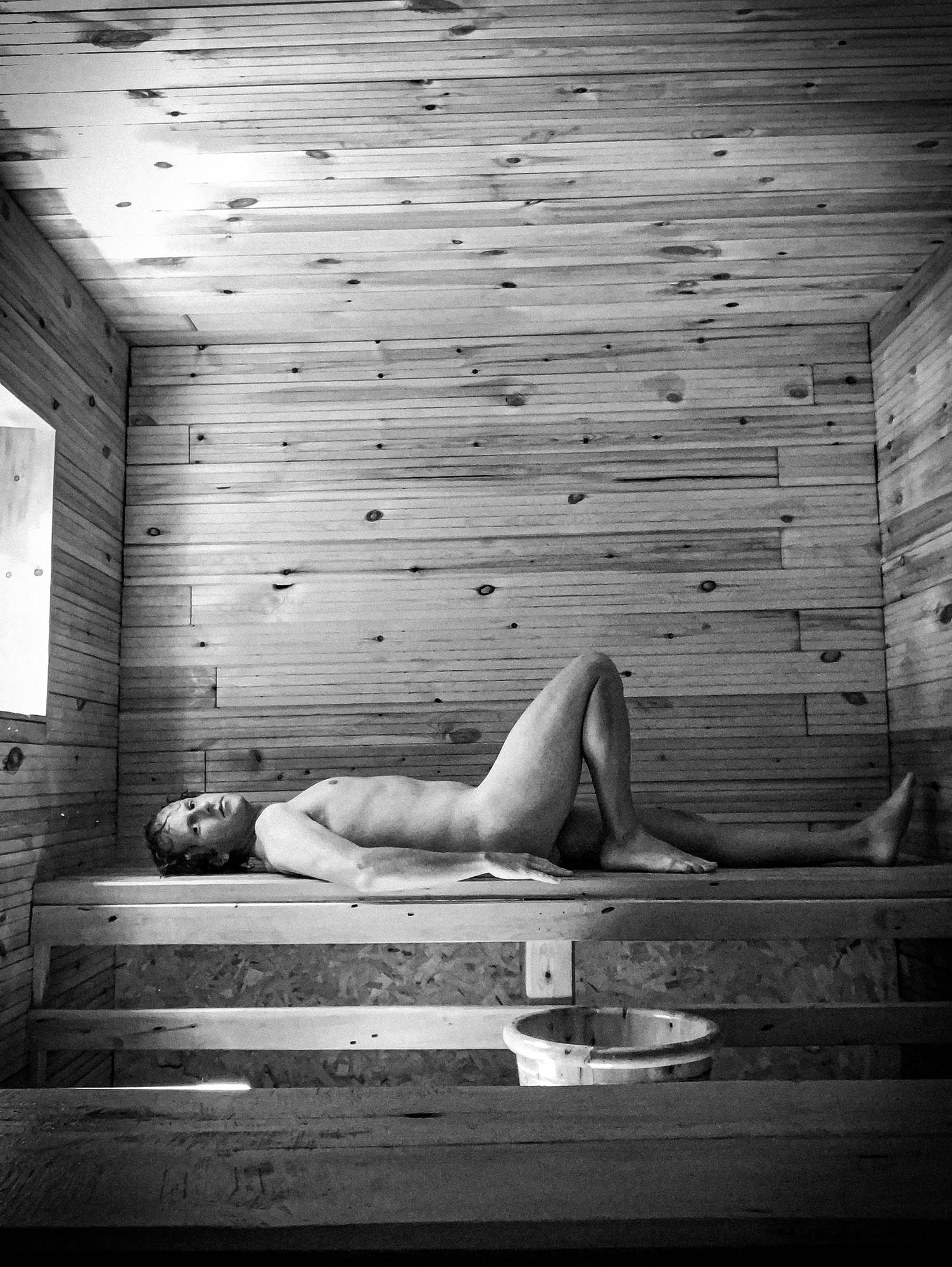 Ben naked in a sauna
