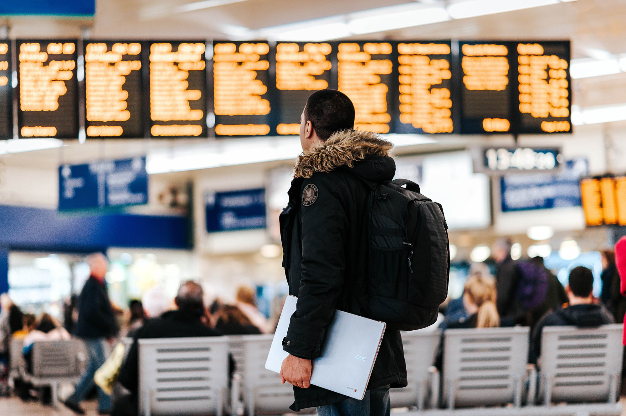Flight screens inside airport - buying the right travel insurance article